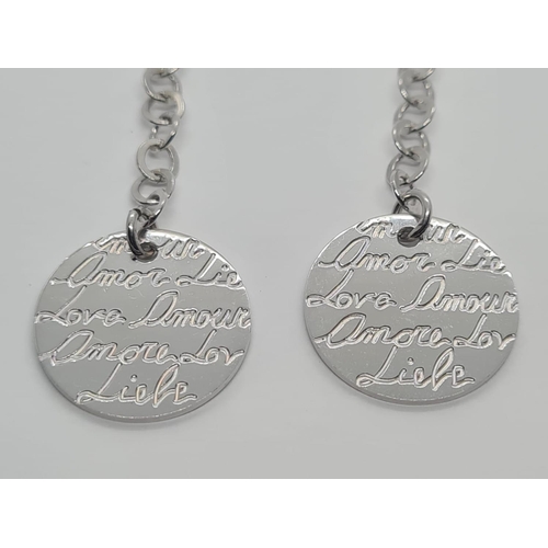 569 - Sterling Silver drop earrings with Love written in various languages, weight 6.7g and 6.5cm drop app... 