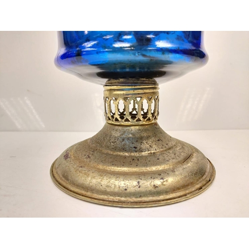 609 - Vintage, blue glass oil lamp, with gold decor base and middle section. 34cm height.