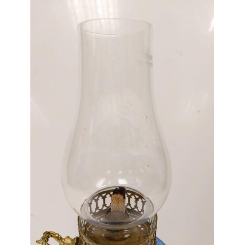 609 - Vintage, blue glass oil lamp, with gold decor base and middle section. 34cm height.