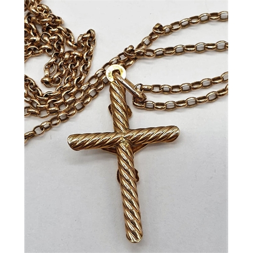 124 - 9ct gold cross pendant on a 52cm long 9ct gold belcher  chain, weight 4g and cross size 3x2cm approx