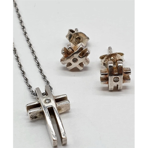 460 - Silver and diamond cross and earrings, mounted on fine silver chain, hash/grid design with diamond p... 