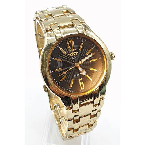 465 - Gents N.Y. wristwatch. Black face, gold tone model. Full working order.