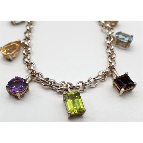 480 - Silver bracelet with gem stones mounted in charm bracelet fashion. Stones to include amethyst, garne... 