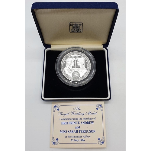 484 - ROYAL MINT 1986  SILVER coin to commemorate  the ROYAL WEDDINGS, weigh 37G in original box and paper... 