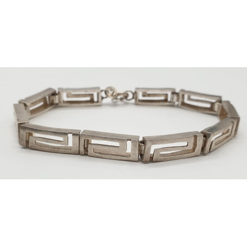 605 - A silver bracelet in byzantine design. 18.1 grams. 18cm length.