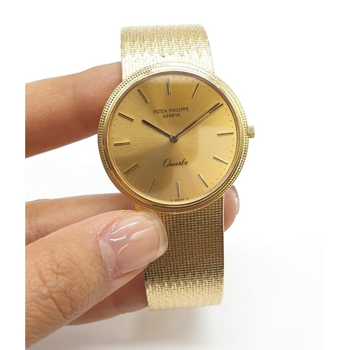 21 - Vintage 18ct gold Patek Phillip Geneve quartz dress watch, weight 82g and 34mm case.