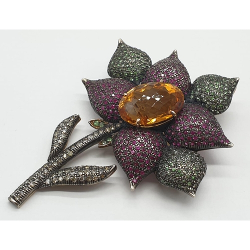 31 - Vintage flower brooch with large citrine centre surrounded by emerald, ruby and diamonds, set in 15c... 