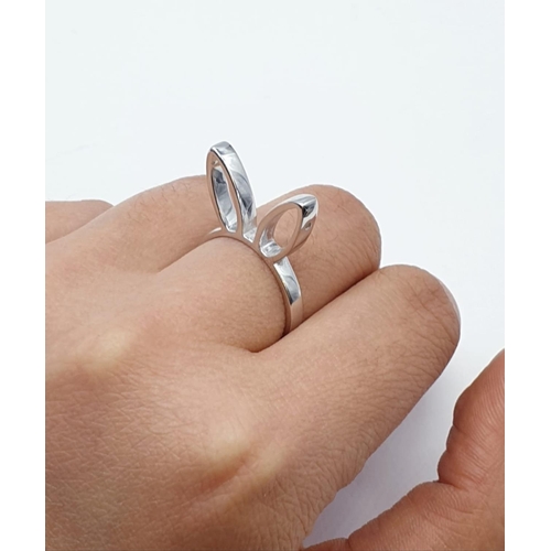 471 - Sterling Silver Playboy bunny ring, weight 3.7g and size M