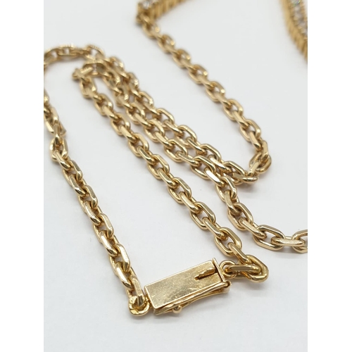 519 - 18CT YELLOW GOLD AND DIAMOND NECKLACE IN A V SHAPED DESIGNED, WEIGHT 21.4G AND 38CM LONG APPROX