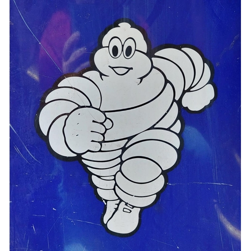 657 - A vintage 1960's aluminium Michelin tyres sign including the iconic 'Michelin Man'. Yellow print on ... 