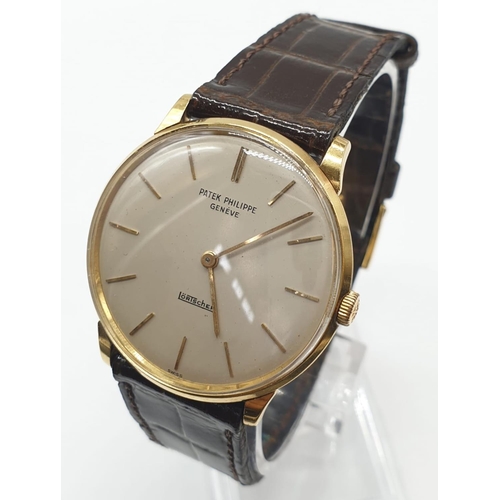 28 - Vintage gents 18ct gold Patek Phillip  watch with original crocodile strap, 34mm case.