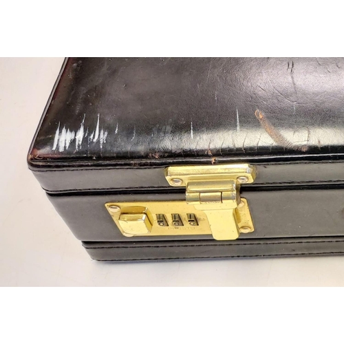 378 - A black leather briefcase with numerical locks in used condition.