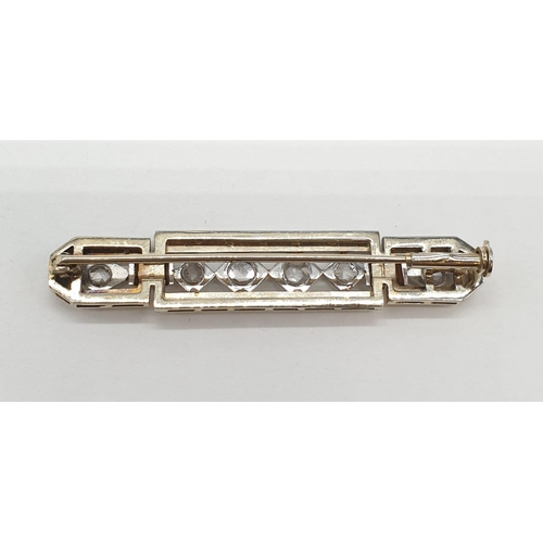 79 - Vintage 18ct gold art deco style bar brooch with 6 diamonds, weight 7.84g and 5cm long approx.