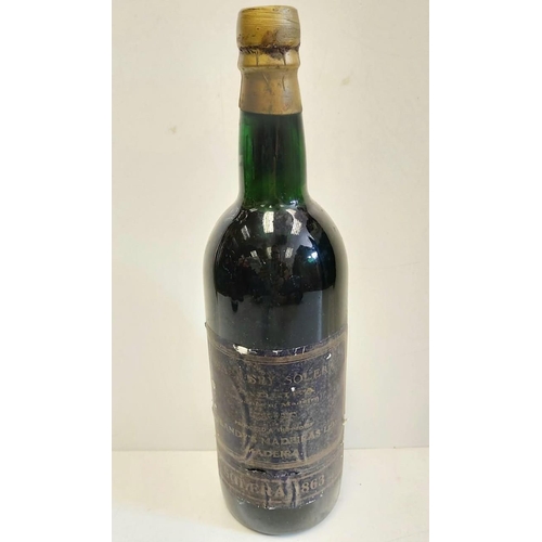 59 - The definition of rarity. A bottle of 1863 Blandys Solera Madeira wine.