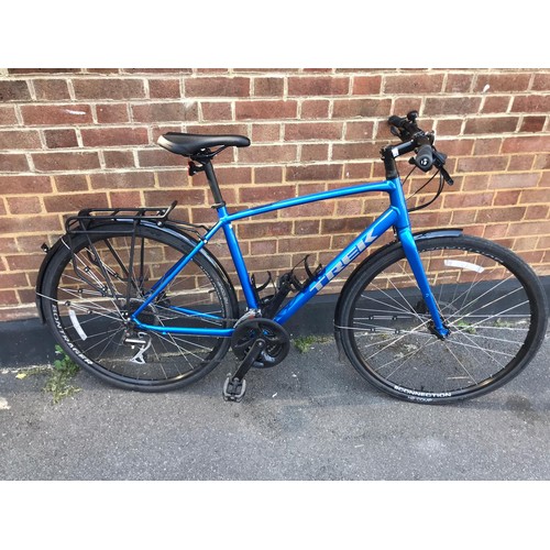 670 - Trek FX2 mountain bike on large frame. Hybrid bike with hydro brakes. Mint condition.