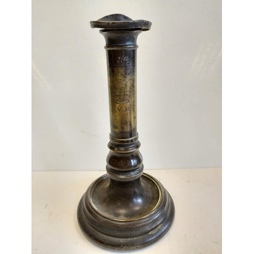 663 - A pair of Victorian brass candlesticks, engraved with VR next to crown. 22cm high.