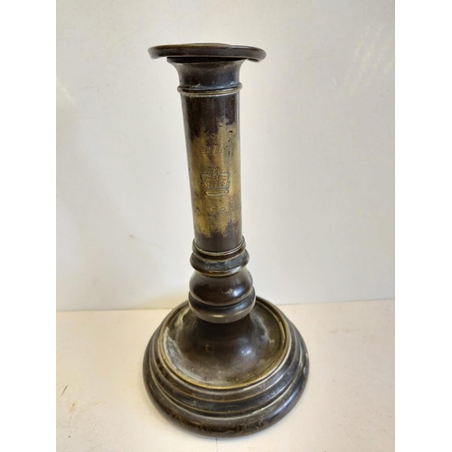 663 - A pair of Victorian brass candlesticks, engraved with VR next to crown. 22cm high.