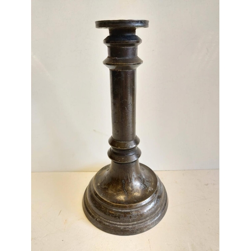 665 - A pair of Victorian brass candlesticks.