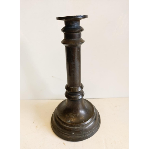 665 - A pair of Victorian brass candlesticks.