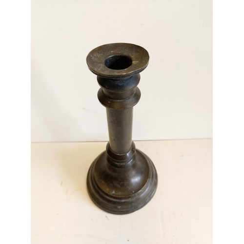 665 - A pair of Victorian brass candlesticks.