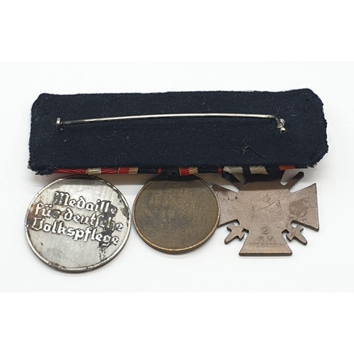 71 - WW2 German Medal Group consisting of the WW1 Imperial German Hindenburg Cross of honour, WW2 3rd Rei... 