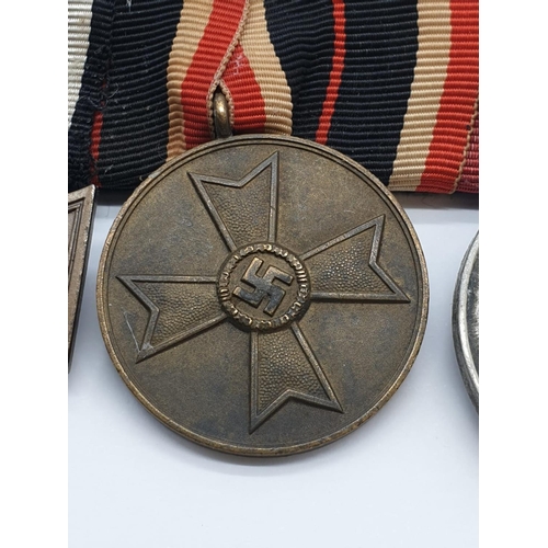 71 - WW2 German Medal Group consisting of the WW1 Imperial German Hindenburg Cross of honour, WW2 3rd Rei... 