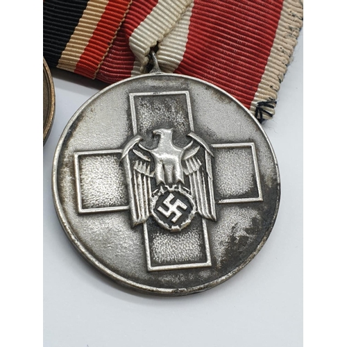 71 - WW2 German Medal Group consisting of the WW1 Imperial German Hindenburg Cross of honour, WW2 3rd Rei... 