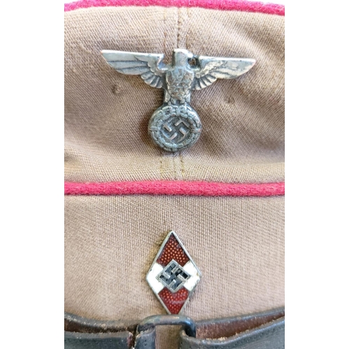 22 - Hitler Youth Visor Cap. A little tatty, but nothing that would prevent it from becoming the centrepi... 