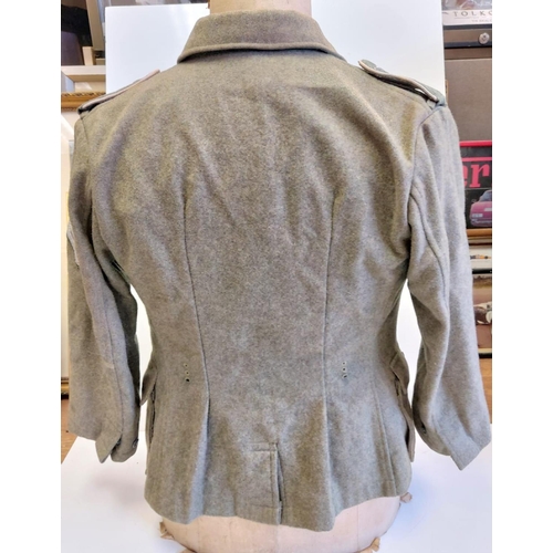 62 - German M42 Field Blouse. Maybe a re-enactors jacket or movie prop with original insignia and wound b... 