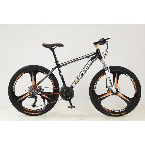 695 - Mountain bike in orange and black 27 speed gears with 26