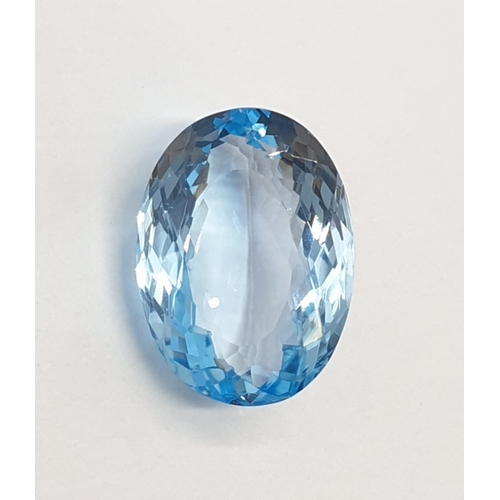 379 - A 17.33 Cts Blue topaz. Oval mixed cut. IDT certification included.