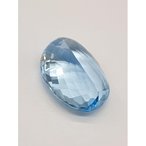 379 - A 17.33 Cts Blue topaz. Oval mixed cut. IDT certification included.