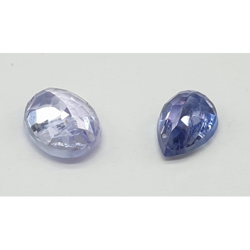 449 - 0.95 Cts Natural tanzanite, Oval mixed cut stone, and 0.60 Cts Natural tanzanite, Pear shaped stone.