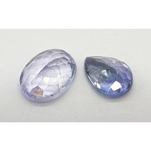 449 - 0.95 Cts Natural tanzanite, Oval mixed cut stone, and 0.60 Cts Natural tanzanite, Pear shaped stone.