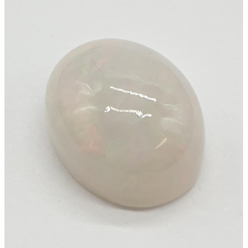 547 - 4.25 Cts Opal. Oval cabochon. Stone is iridescent and has good colour.  IDT certification included.