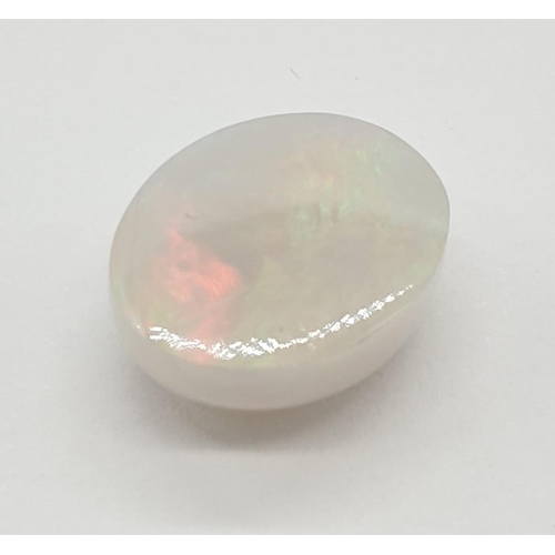 547 - 4.25 Cts Opal. Oval cabochon. Stone is iridescent and has good colour.  IDT certification included.