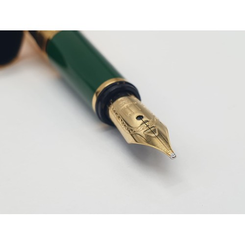 20 - Dunhill fountain pen with 18ct gold nib and gold plated shell, jade decorated in original box (new, ... 