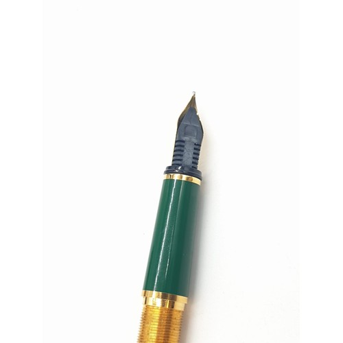 20 - Dunhill fountain pen with 18ct gold nib and gold plated shell, jade decorated in original box (new, ... 