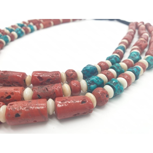 155 - An early 70s Indian, Hippy style, three rows of red coral and turquoise necklace, originally purchas... 