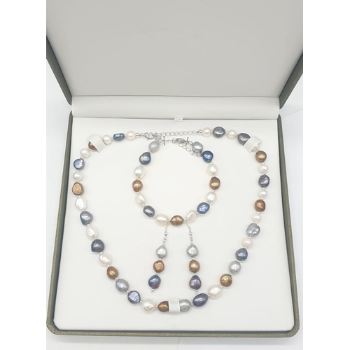 40 - A good collection of Kasumi pearls with vivid colours forming a necklace, bracelet and earrings set,... 