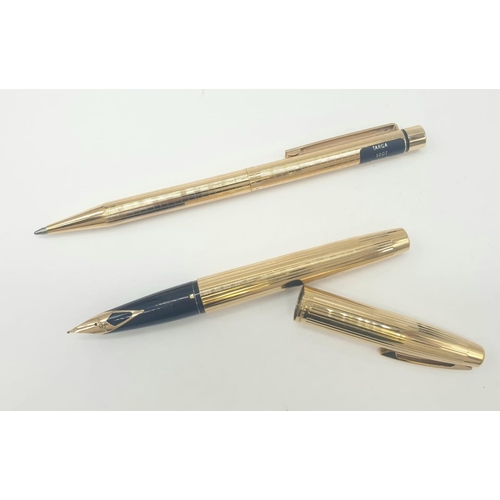 89 - A late 70’s American Sheaffer,  gold electroplated, fountain pen and pen in original box. With parts... 