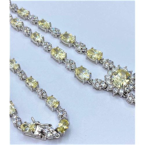 710 - Silver heavy NECKLACE with white and yellow stones.  45.78g     40cm.