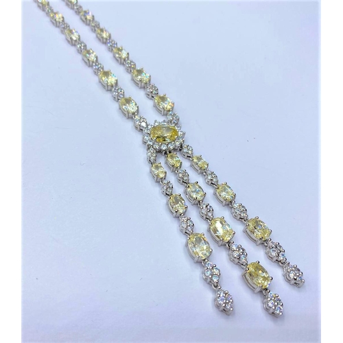 710 - Silver heavy NECKLACE with white and yellow stones.  45.78g     40cm.