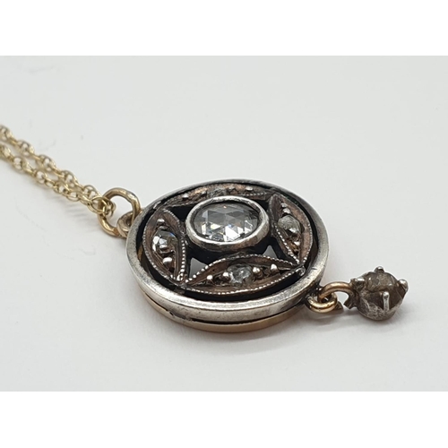 825 - Vintage 14ct gold and silver rose diamond pendant on a 9k gold 48cm long chain, weight 2.78g and pen... 