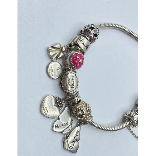 539 - Pandora style silver charm BRACELET with butterfly charms, weight 41.53g approx