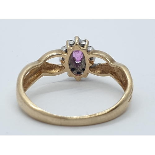 631 - Yellow metal Ruby and Diamond RING.  1.6g   Size J