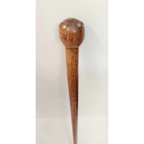 373 - Gentleman's antique walking stick, with brass studs on the holder and a brass tip-end, 88cm long