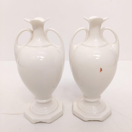 449 - Pair of small city of London ornamental ceramic vases, 12cm tall