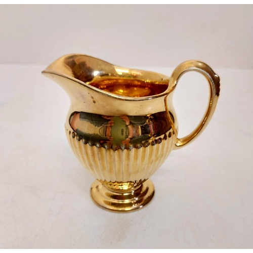 461 - Stunning Royal Winton Grimwads golden tea set including a ribbed teapot, milk jug and sugar bowl, te... 