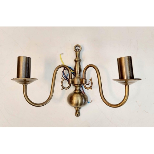 485 - A pair of gilded wall lights, with brass effect. Made by Franklite, unused - as new. 32 x 20cm.